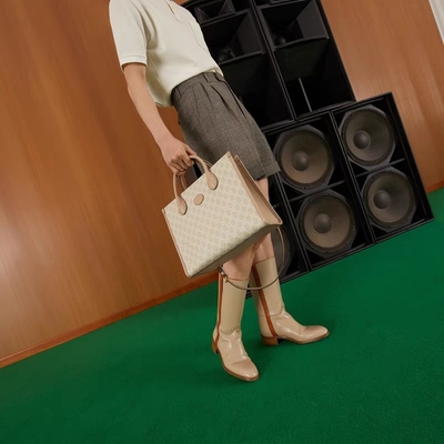 Túi đeo vai vải Gucci nhỏ tối cao với G lồng vào nhau